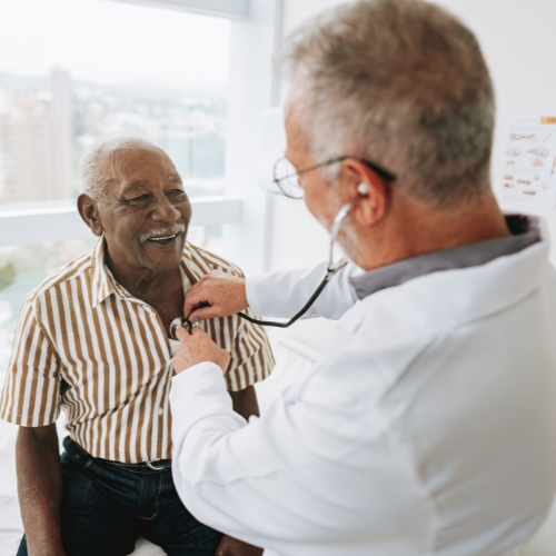 Man getting heart checked by doctor