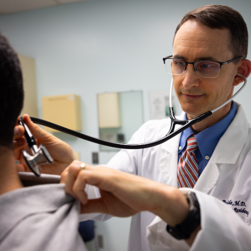 Doctor checking patients vitals