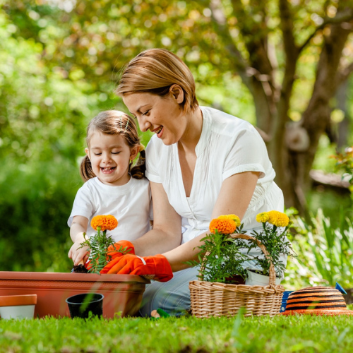Woman and child gardening