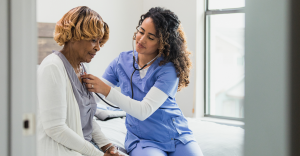 woman getting checked by doctor