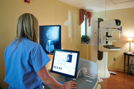 nurse prepping for mammogram
