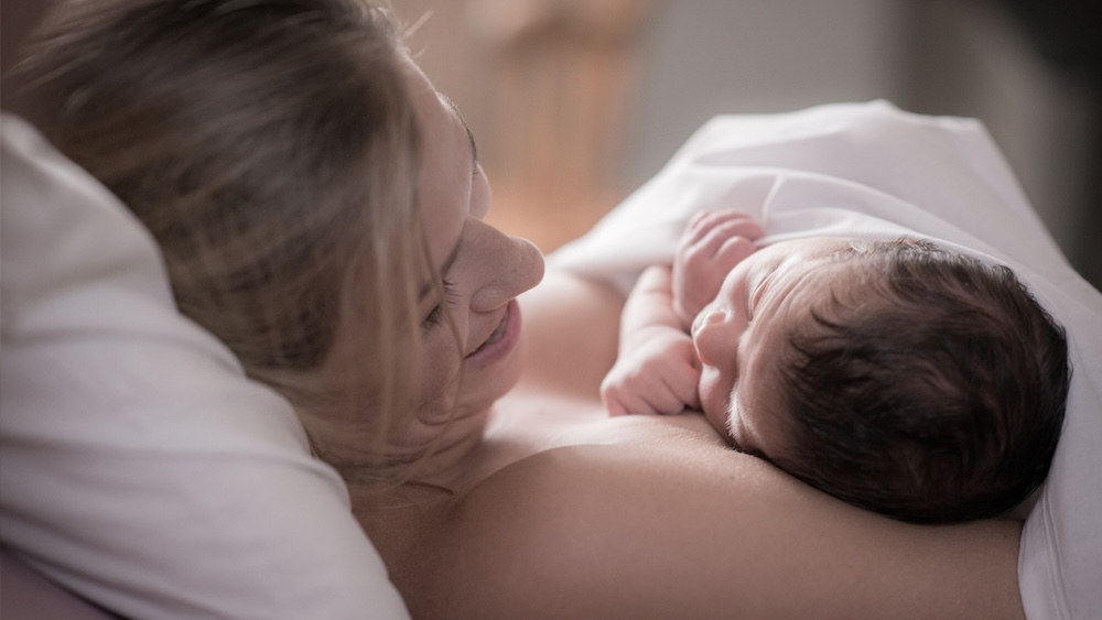 woman holding baby