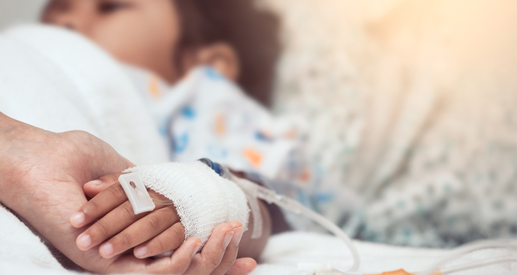 child in hospital bed
