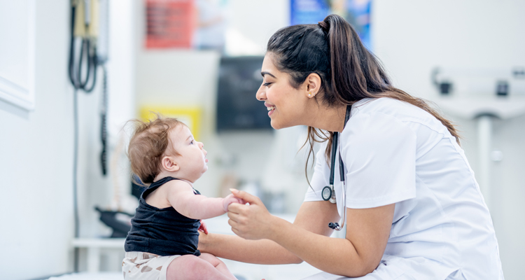 Doctor with baby at Specialty Clinic