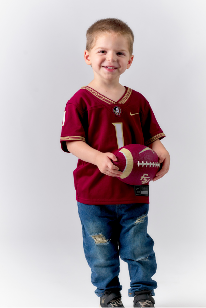 Maddox Deusinger with football