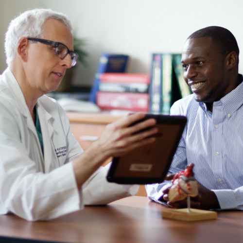 Doctor talking with patient