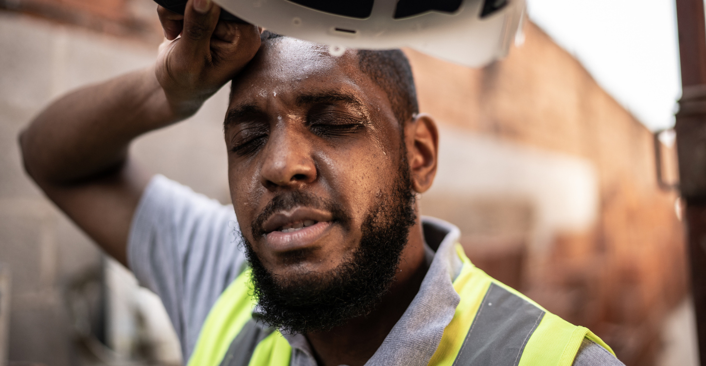 man sweating while working