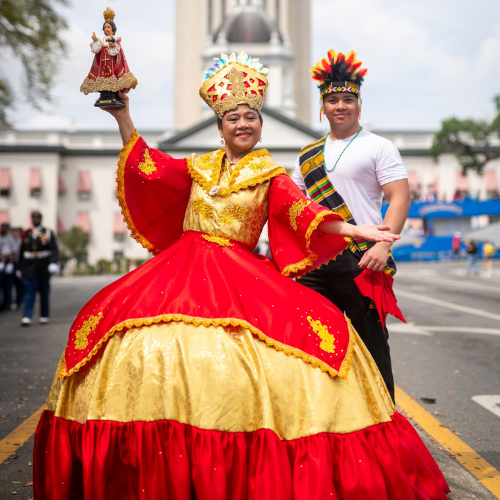 Nelly and her son in traditional Filipino attire