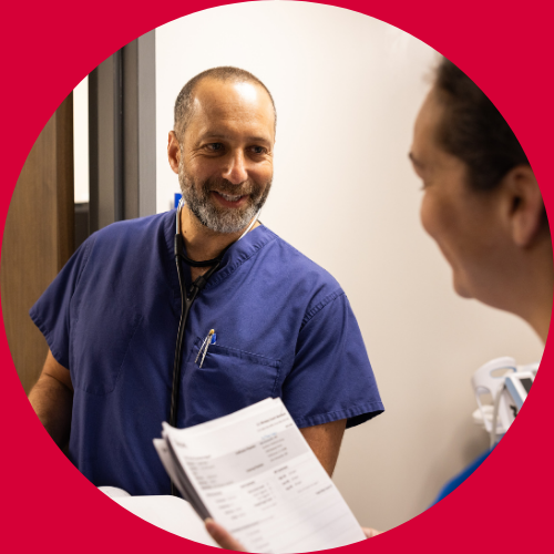 Dr. Silberman talking with nurse