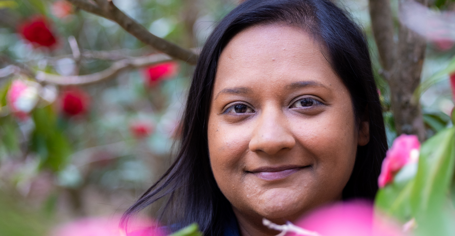 Kristal smiles outside