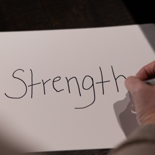 Kelly writing "strength"