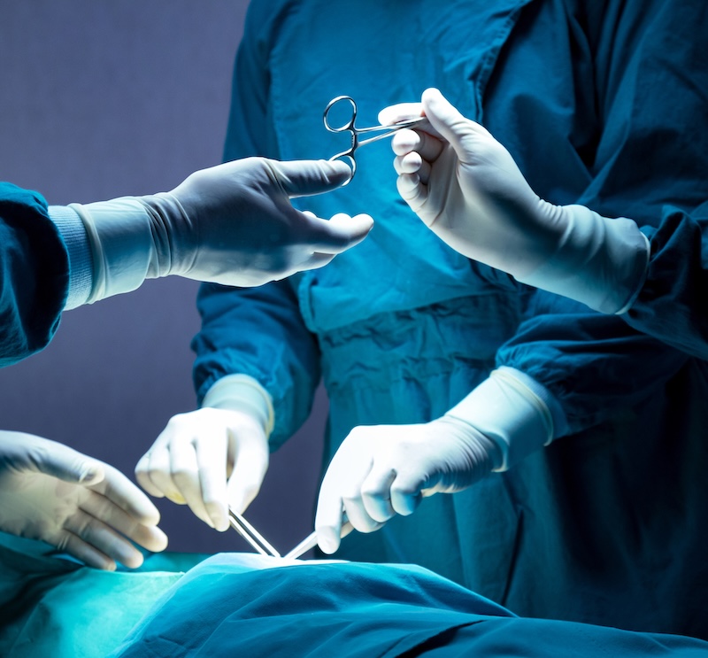 Surgeons performing surgery
