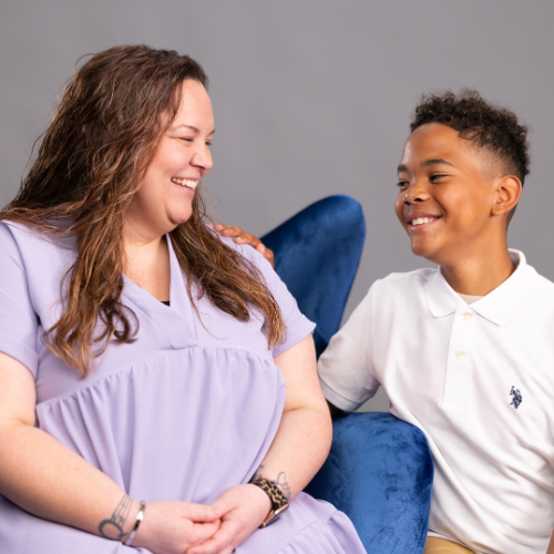 Sheyla and Cooper looking at each other and smiling