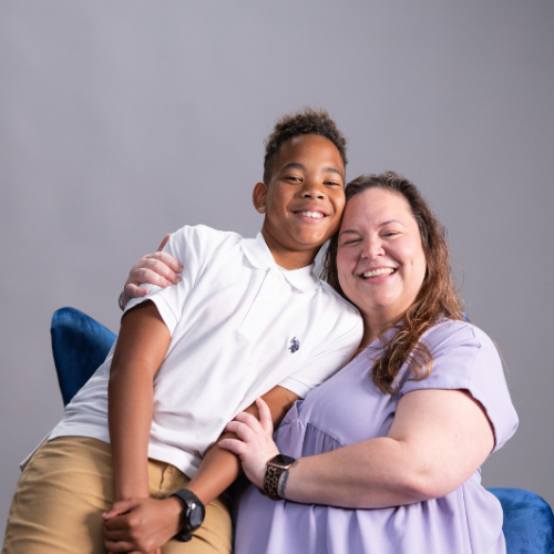 Sheyla and Cooper hugging and smiling