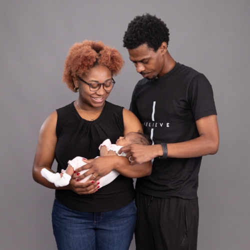 Troy, his wife, and their child