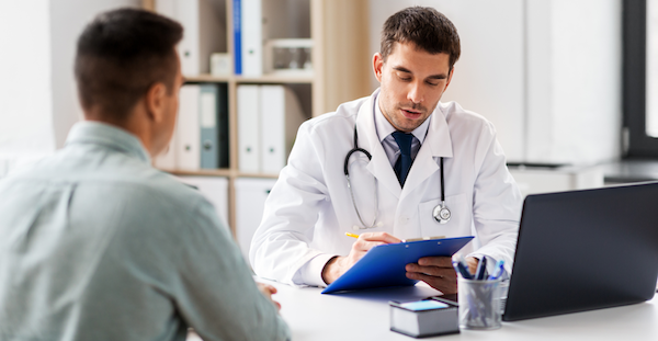 Doctor talking with patient