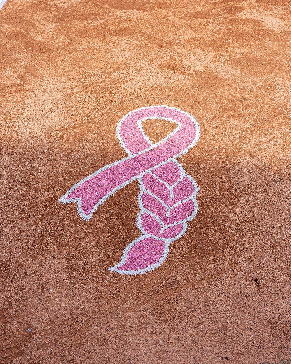 Softball clay with breast cancer awareness ribbon