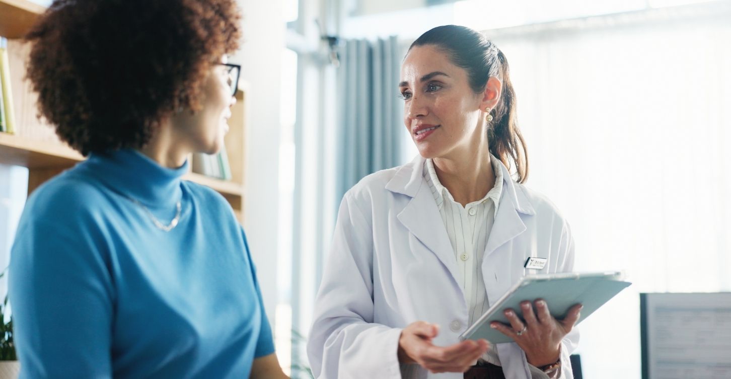 The BRCA Connection: What Your Genes Tell You About Breast and Gynecologic Cancers with a doctor and patient.