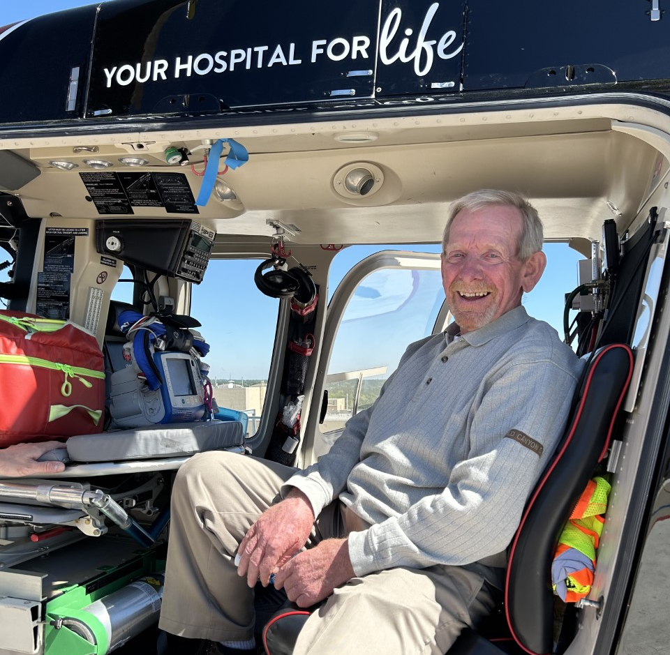 Clifford Daugherty in TMH Helicopter