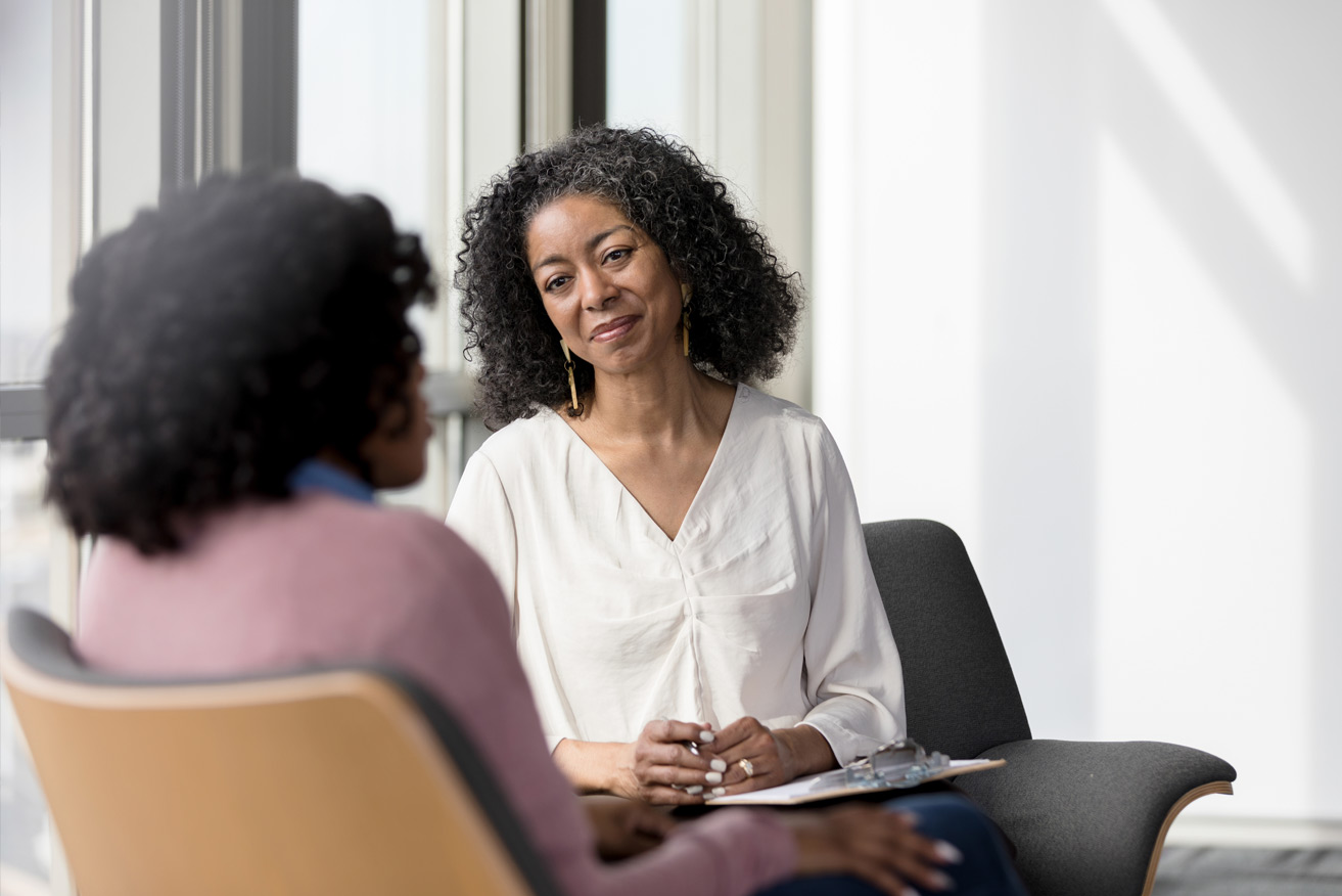 Two women talking to each other