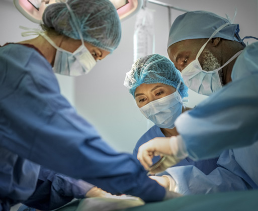 Three doctors in surgery
