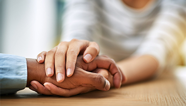 Someone holding another person's hand