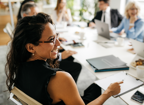 A woman at a board meeting