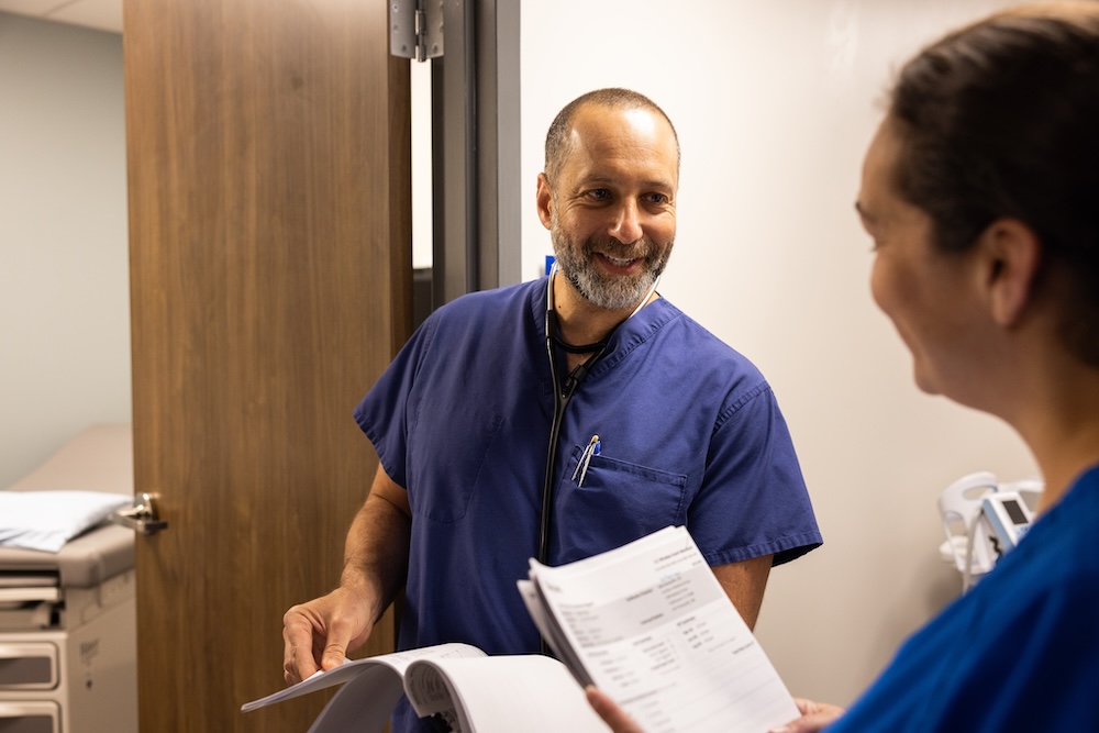 Dr. Silberman talking to a nurse