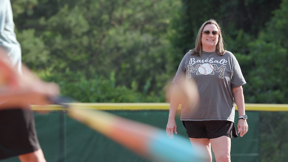 Lindsey outside on baseball field